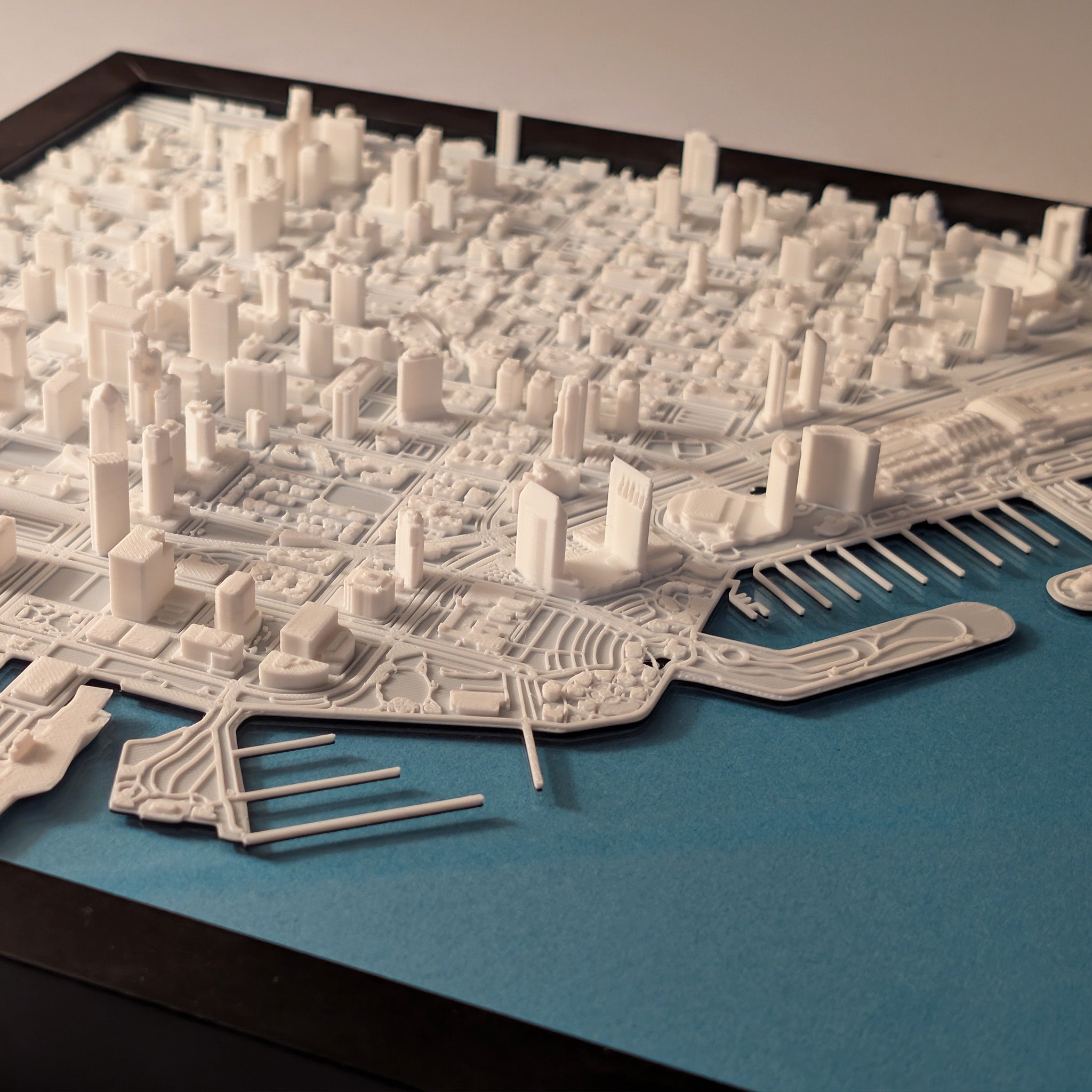 3D model of a cityscape on a blue base