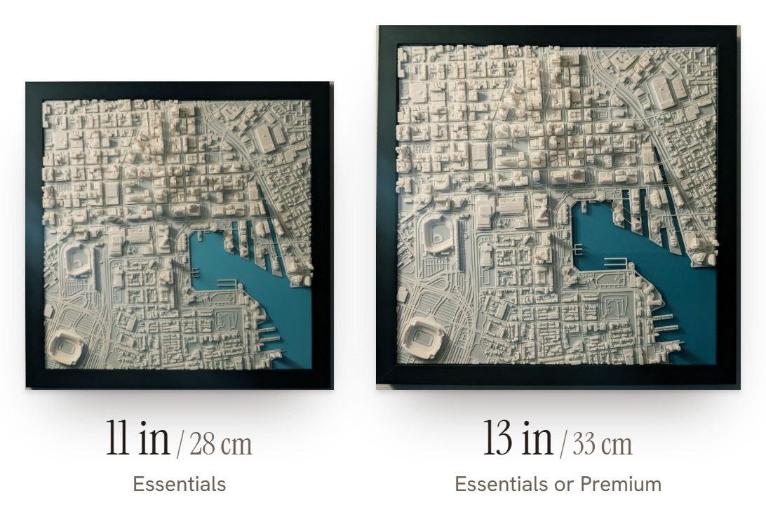 An 11 inch and a 13 inch framed 3D map side by side, at true scale